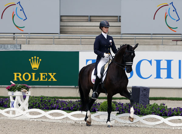 Caroline Roffman competing Sagacious HF as the first American combination ever to ride in the World Equestrian Festival's Under-25 Division at Aachen, Germany. © 2013 Ken Braddick/dressage-news.com