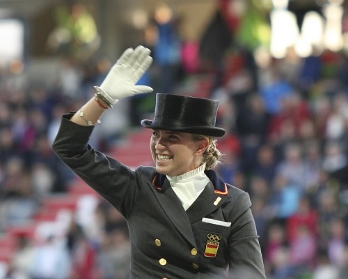 An ecstatic Morgan Barbancon or Spain after her ride on Painted Black ©Ilse Schwarz dressage-news.com